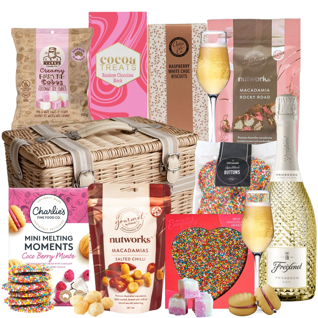 Gourmet gift basket with chocolate, cookies, and Freixenet Cordon Negro wine.