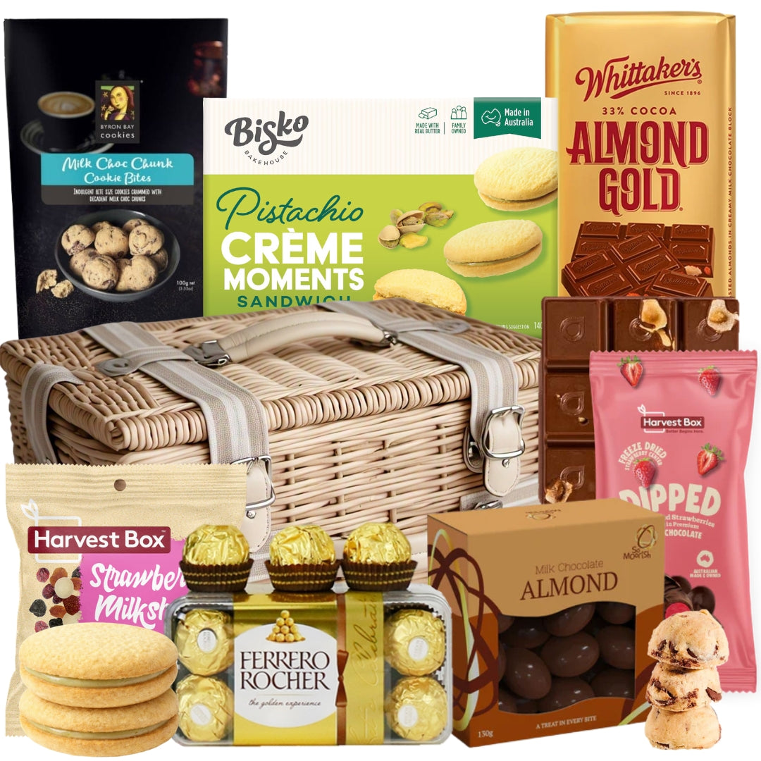 Teacher thank you gift hamper featuring chocolates, biscuits, coated almonds, freeze-dried strawberries, and gourmet sweet treats