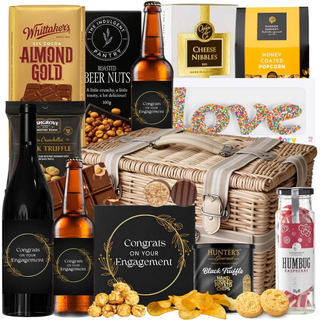 Engagement gift basket for couples featuring Shiraz, engagement beers, chocolates, popcorn, chips, cheese nibbles, and gourmet snacks