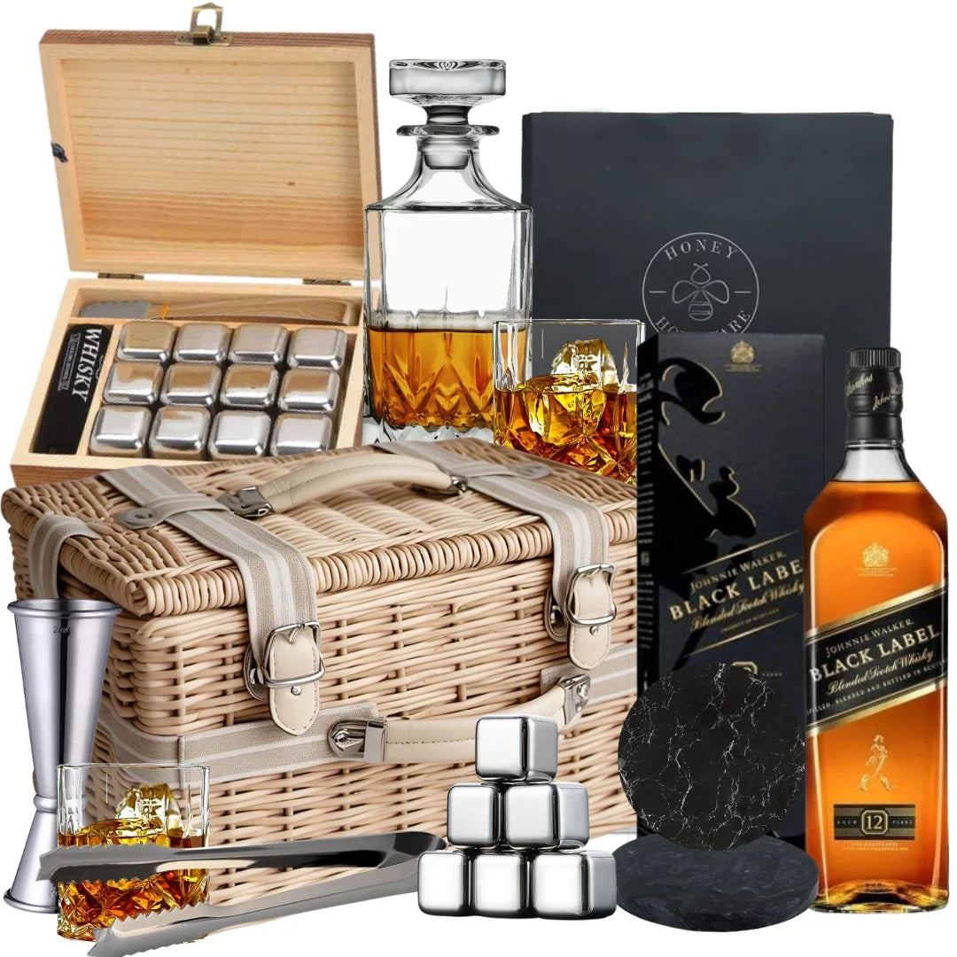 Johnnie Walker Black Label whisky gift hamper featuring a glass decanter set, whisky ice gift set, and marble coasters