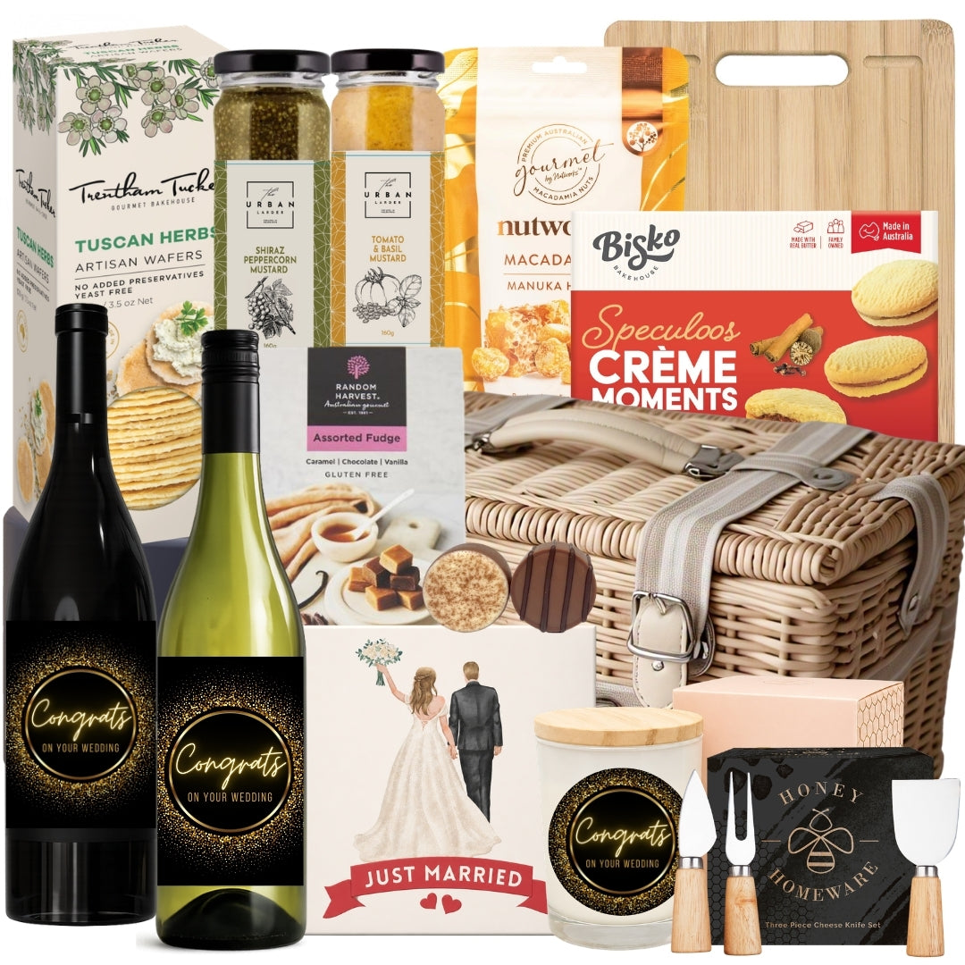 Wedding present gift basket featuring Shiraz, Chardonnay, a soy candle, cheese board set, gourmet condiments, biscuits, caramel fudge, and sweet treats