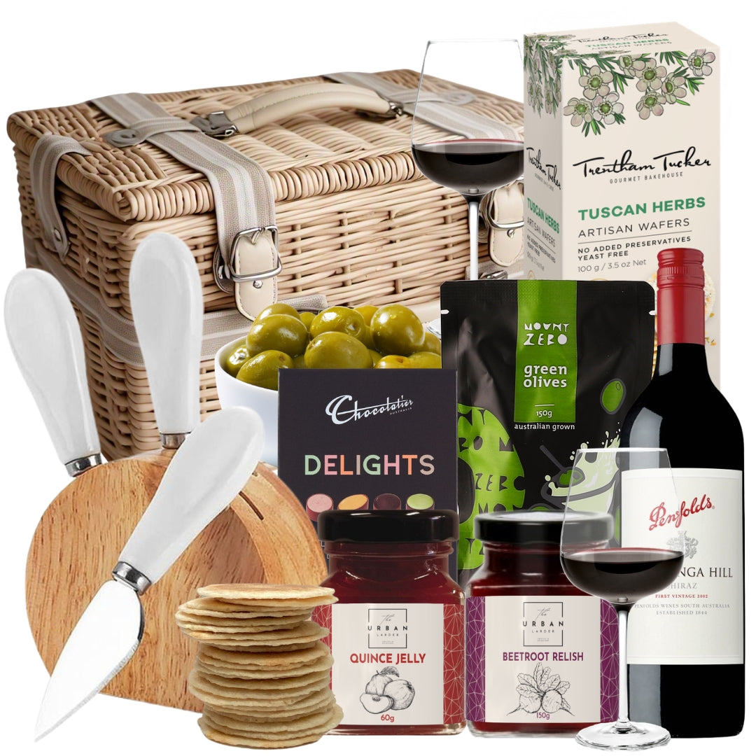Wine housewarming gift basket featuring Penfolds Koonunga Hill Shiraz, savoury wafers, quince jelly, beetroot relish, olives, and chocolates